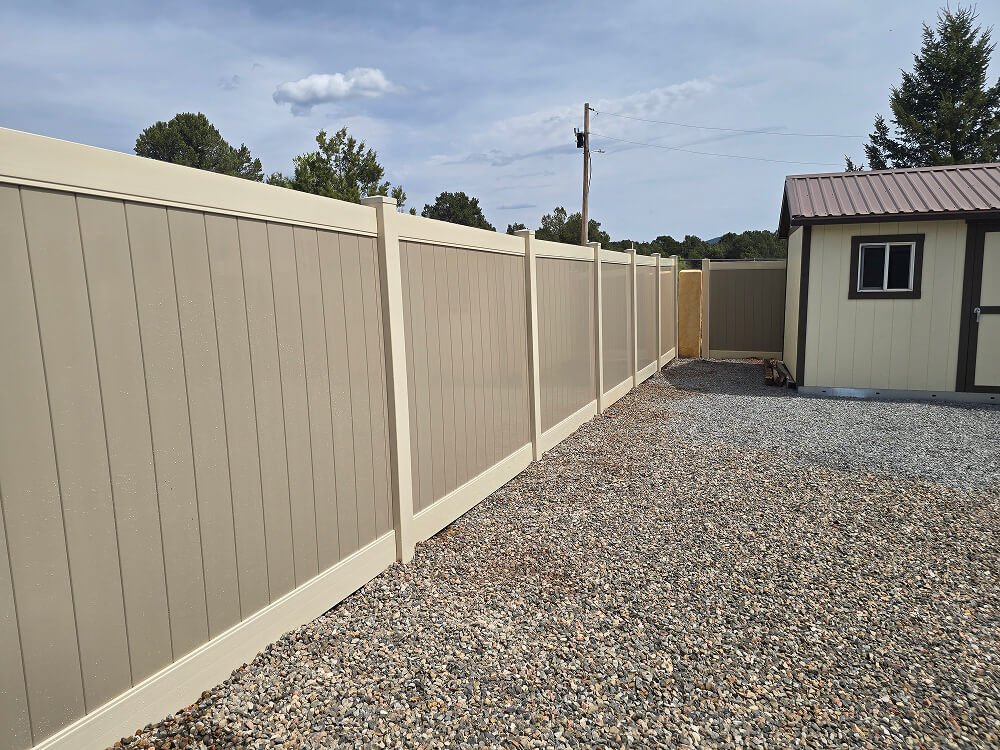 Tan and white vinyl privacy fencing in Albuquerque NM